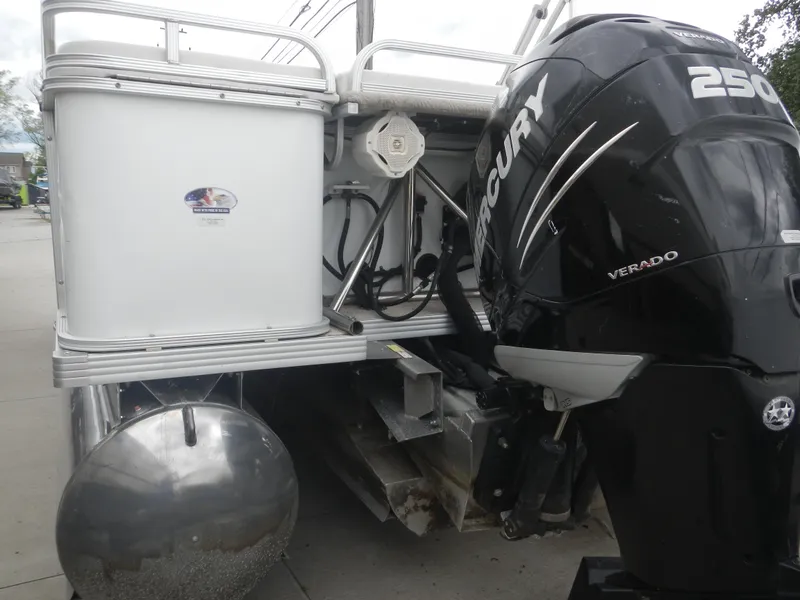 Slide: The Image of Pontoon boat with Mercury Verado 250 engine, Crest III model, 2010. - 2