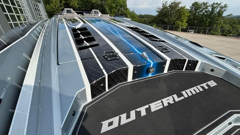 Slide: The Image of 2025 Outerlimits 50 SL Crypto II boat with sleek design and modern features. - 13