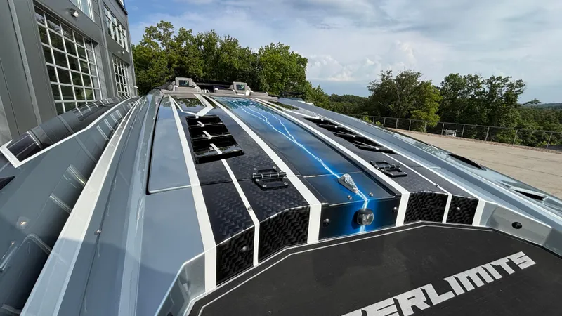 Slide: The Image of 2025 Outerlimits 50 SL Crypto II boat with sleek design and modern features. - 14