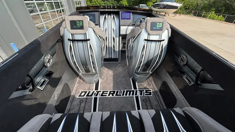 Slide: The Image of Interior of 2025 Outerlimits 50 SL Crypto II speedboat, featuring modern design and advanced controls. - 17