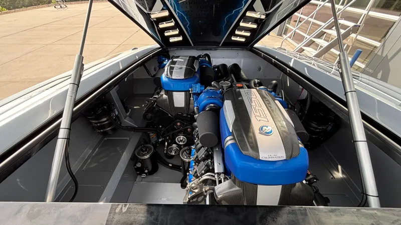 Slide: The Image of Engine compartment of 2025 Outerlimits 50 SL Crypto II with dual engines. - 18