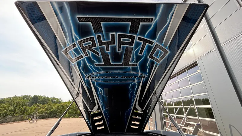 Slide: The Image of 2025 Outerlimits 50 SL Crypto II boat with striking lightning graphics. - 20