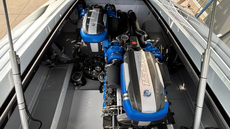 Slide: The Image of Engine compartment of 2025 Outerlimits 50 SL Crypto II with dual 1550 horsepower engines. - 21