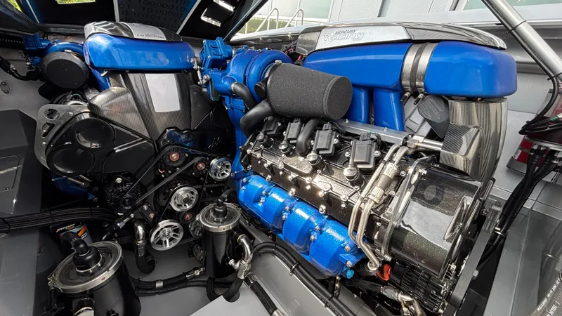 Slide: The Image of Engine of 2025 Outerlimits 50 SL Crypto II, featuring blue and carbon fiber components. - 22