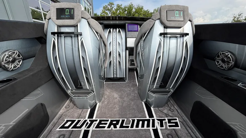 Slide: The Image of Interior of 2025 Outerlimits 50 SL Crypto II boat with modern design and advanced controls. - 27