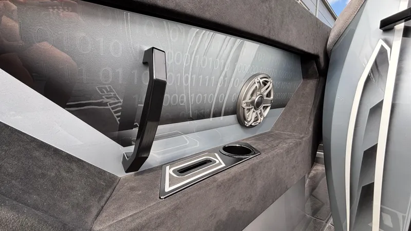 Slide: The Image of Interior of 2025 Outerlimits 50 SL Crypto II with sleek design and modern speaker system. - 28