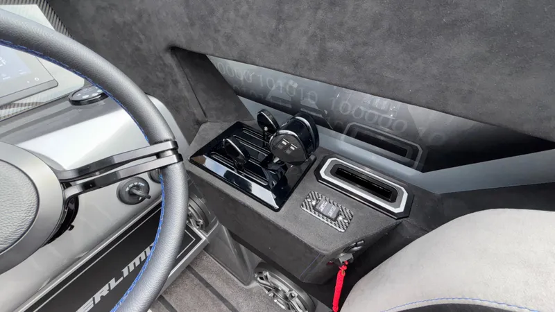 Slide: The Image of Interior of 2025 Outerlimits 50 SL Crypto II, featuring sleek controls and modern design elements. - 32