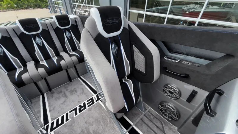 Slide: The Image of Interior of 2025 Outerlimits 50 SL Crypto II with luxury seating and modern design. - 35