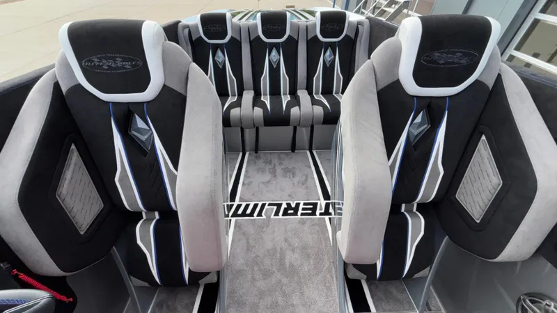 Slide: The Image of Luxurious interior seating of the 2025 Outerlimits 50 SL Crypto II boat. - 36