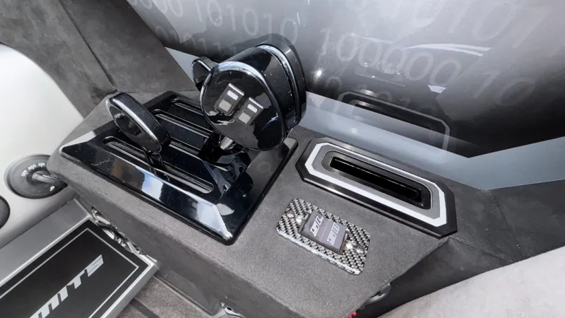 Slide: The Image of Interior controls of 2025 Outerlimits 50 SL Crypto II boat, featuring sleek design and modern technology. - 40