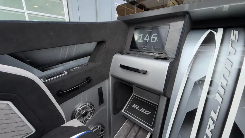 Slide: The Image of Interior of 2025 Outerlimits 50 SL Crypto II, featuring sleek dashboard and digital display. - 41
