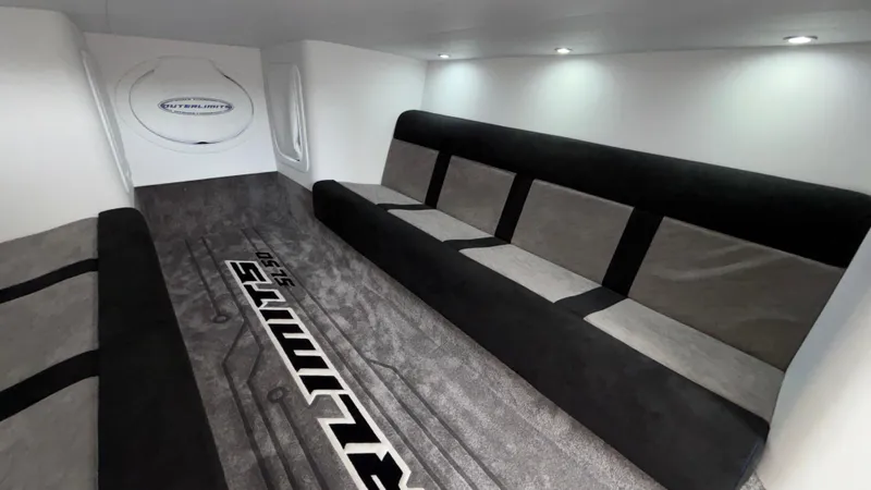 Slide: The Image of Interior of 2025 Outerlimits 50 SL Crypto II luxury boat with modern seating. - 48