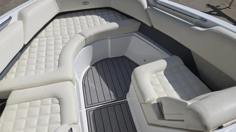 Slide: The Image of Luxurious seating area on 2017 Cobalt R5 WSS Surf boat, featuring quilted upholstery. - 14