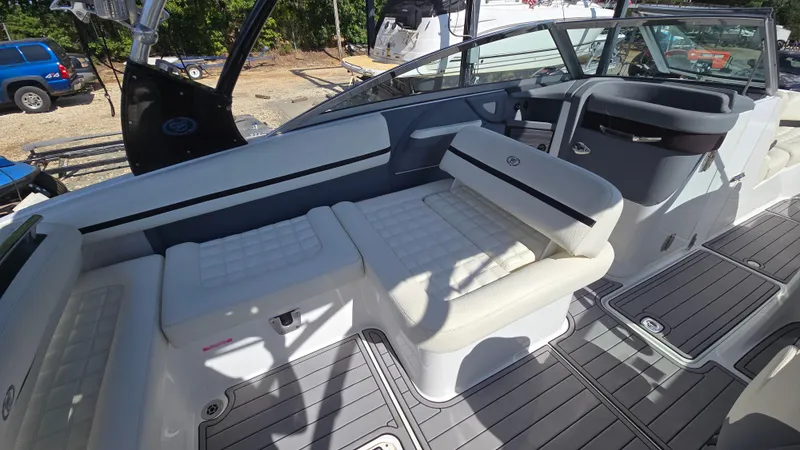 Slide: The Image of 2017 Cobalt R5 WSS Surf boat interior with white seating and sleek design. - 26