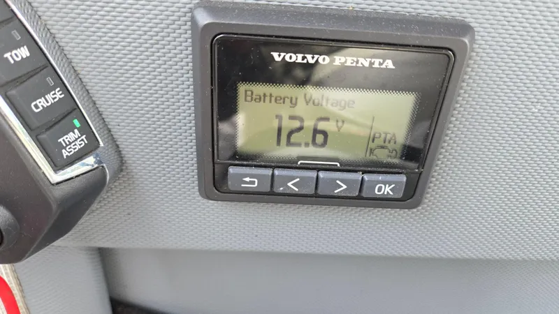 Slide: The Image of Volvo Penta display showing 12.6V battery voltage on 2017 Cobalt R5 WSS Surf boat. - 32