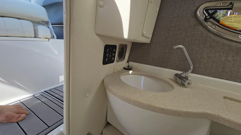 Slide: The Image of 2017 Cobalt R5 WSS Surf boat interior with sink and seating area. - 36