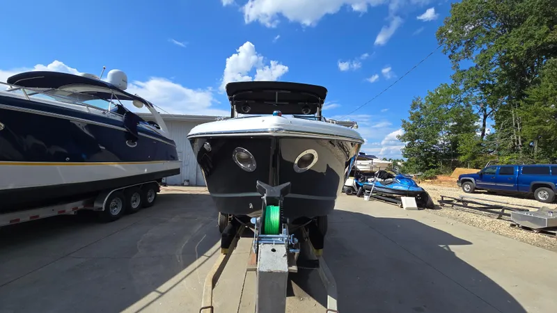 Slide: The Image of 2017 Cobalt R5 WSS Surf boat on trailer under clear blue sky. - 4
