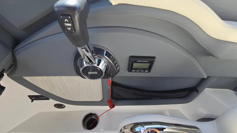 Slide: The Image of 2017 Cobalt R5 WSS Surf boat control panel with throttle and trim switch. - 42