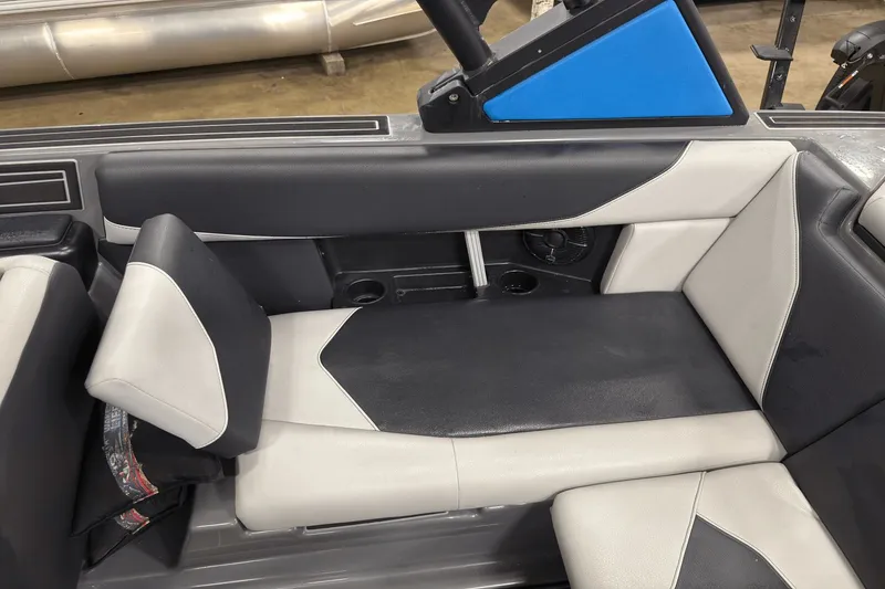 Slide: The Image of 2021 ATX Surf Boats 20 Type-S interior seating with black and white upholstery. - 16