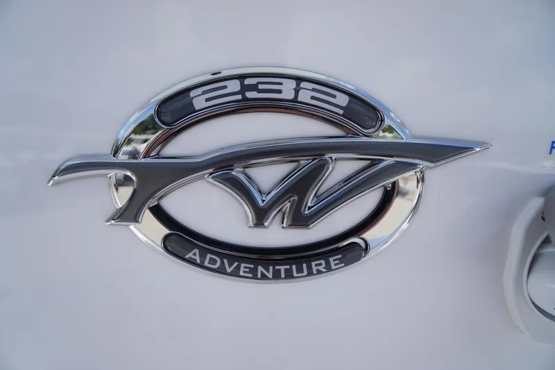 Slide: The Image of Tidewater 232 CC Adventure 2026 emblem on a white surface. - 2