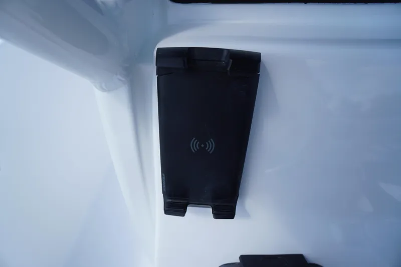 Slide: The Image of Wireless charging pad on 2026 Tidewater 232 CC Adventure boat. - 39