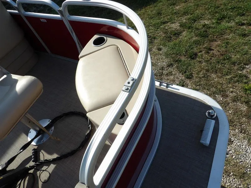 Slide: The Image of 2015 Bennington 20 SFX boat interior with seating and railing, viewed from above. - 15