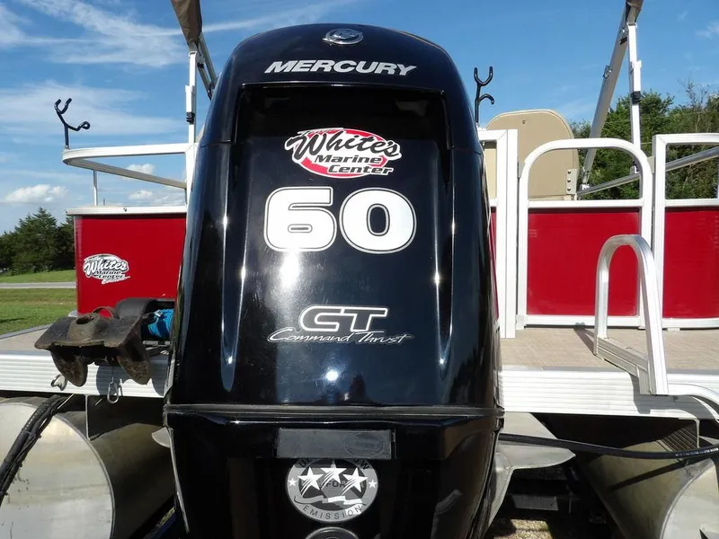 Slide: The Image of 2015 Bennington 20 SFX pontoon boat with Mercury 60 HP engine, red and white design. - 28