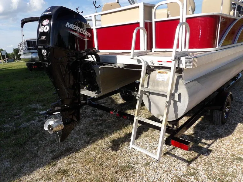 Slide: The Image of 2015 Bennington 20 SFX pontoon boat with Mercury 150 engine and ladder. - 31