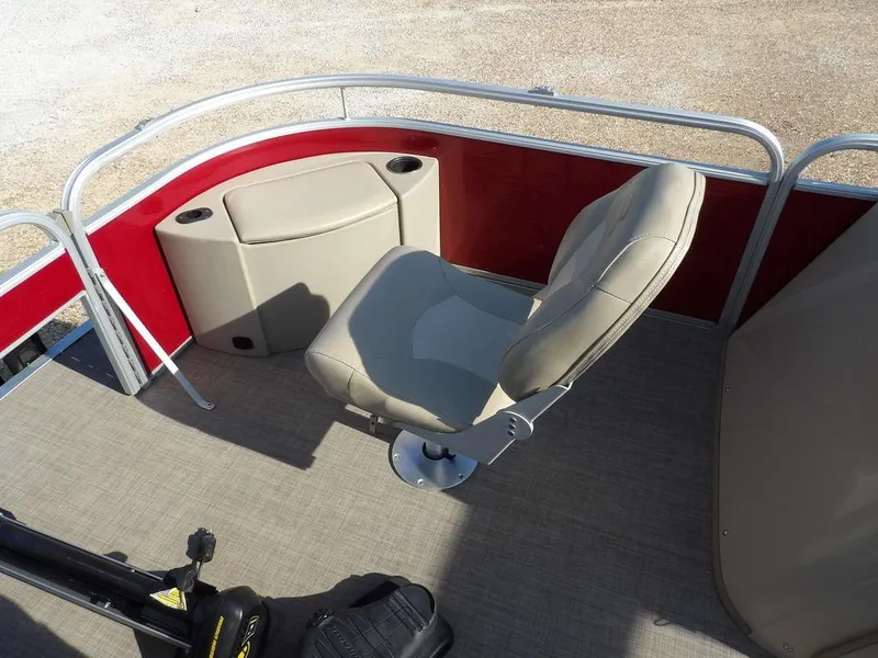 Slide: The Image of 2015 Bennington 20 SFX boat interior with beige seat and red paneling. - 8