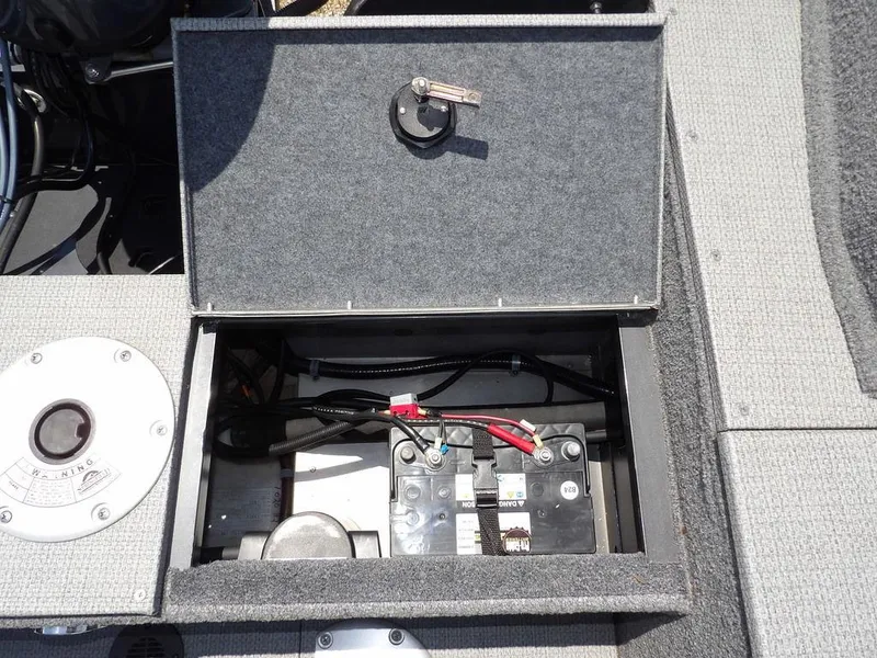 Slide: The Image of Battery compartment of 2022 G3 Angler V164 F boat, open lid showing wiring. - 10