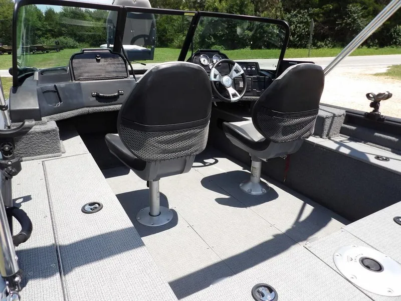Slide: The Image of 2022 G3 Angler V164 F boat interior with dual seats and steering console. - 11