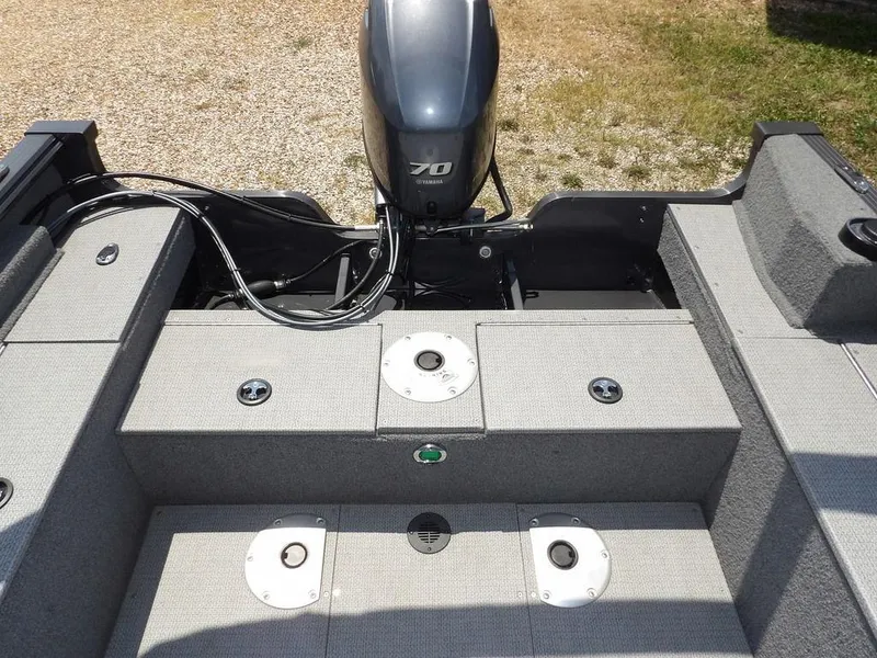 Slide: The Image of 2022 G3 Angler V164 F boat interior with Yamaha 70 engine, featuring storage compartments. - 13