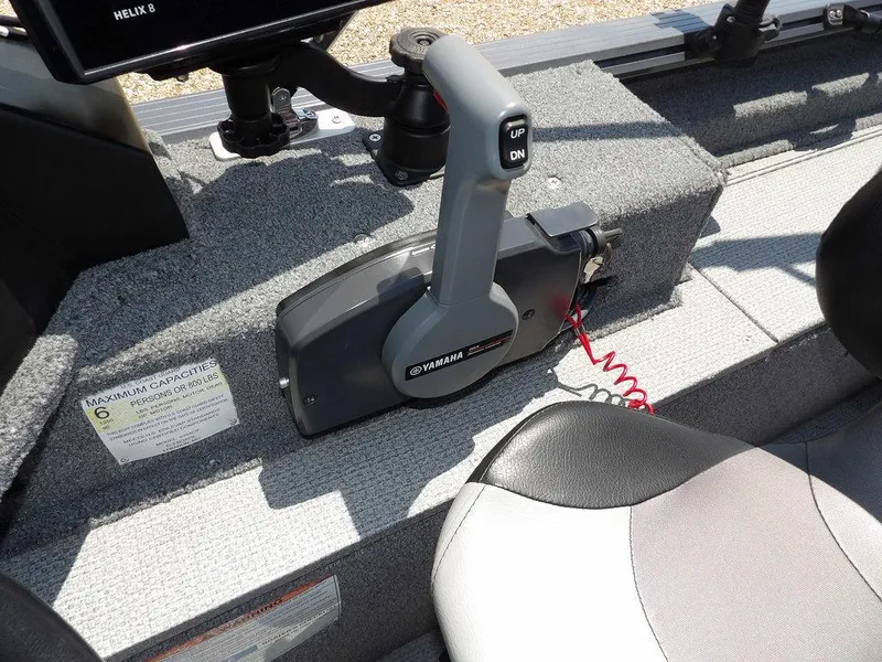 Slide: The Image of 2022 G3 Angler V164 F boat interior with Yamaha control lever and seating. - 23