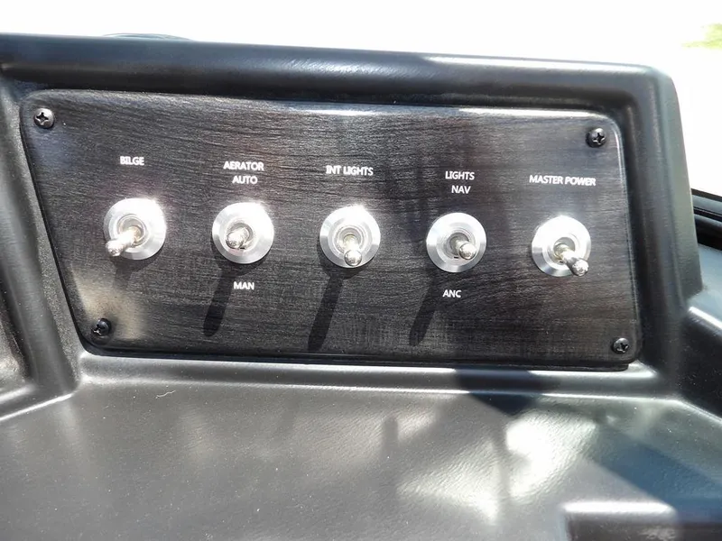Slide: The Image of Control panel of 2022 G3 Angler V164 F boat with labeled switches. - 24