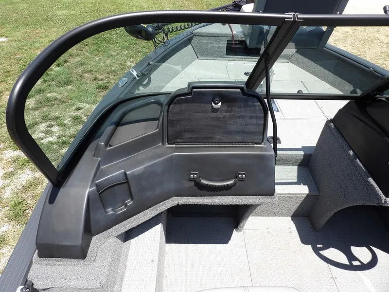 Slide: The Image of 2022 G3 Angler V164 F boat interior with windshield and storage compartment. - 27