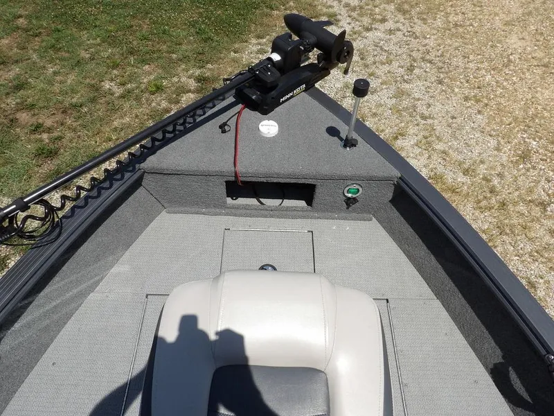 Slide: The Image of 2022 G3 Angler V164 F boat interior with trolling motor and seating. - 36