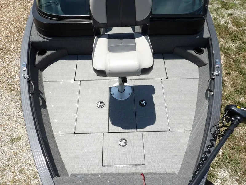 Slide: The Image of 2022 G3 Angler V164 F boat interior with swivel seat and carpeted deck. - 47