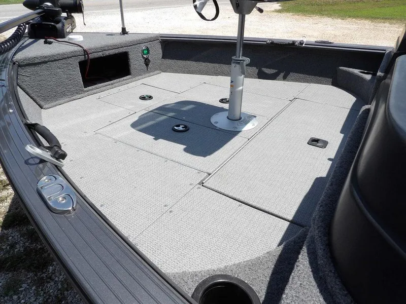 Slide: The Image of 2022 G3 Angler V164 F boat deck with seating and storage compartments. - 7