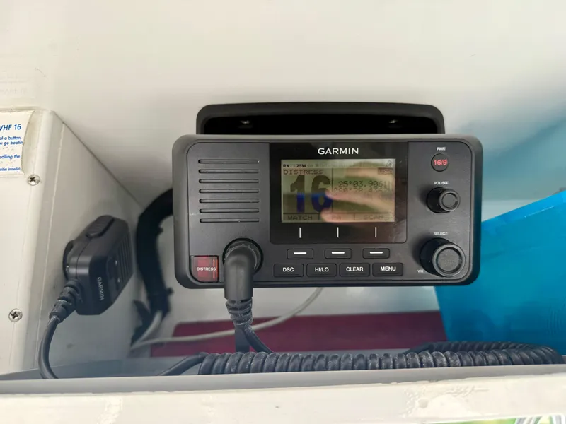 Slide: The Image of Garmin marine radio on 2003 Bluewater Sportfishing 2850 boat dashboard. - 18