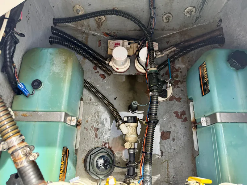 Slide: The Image of 2003 Bluewater Sportfishing 2850 engine compartment with Yamaha components and wiring. - 22