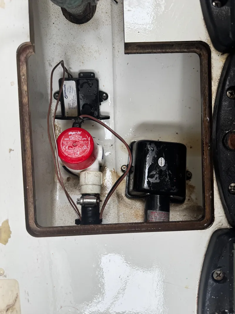 Slide: The Image of Bilge pump system in a 2020 Jeanneau NC Sport 795 boat. - 24