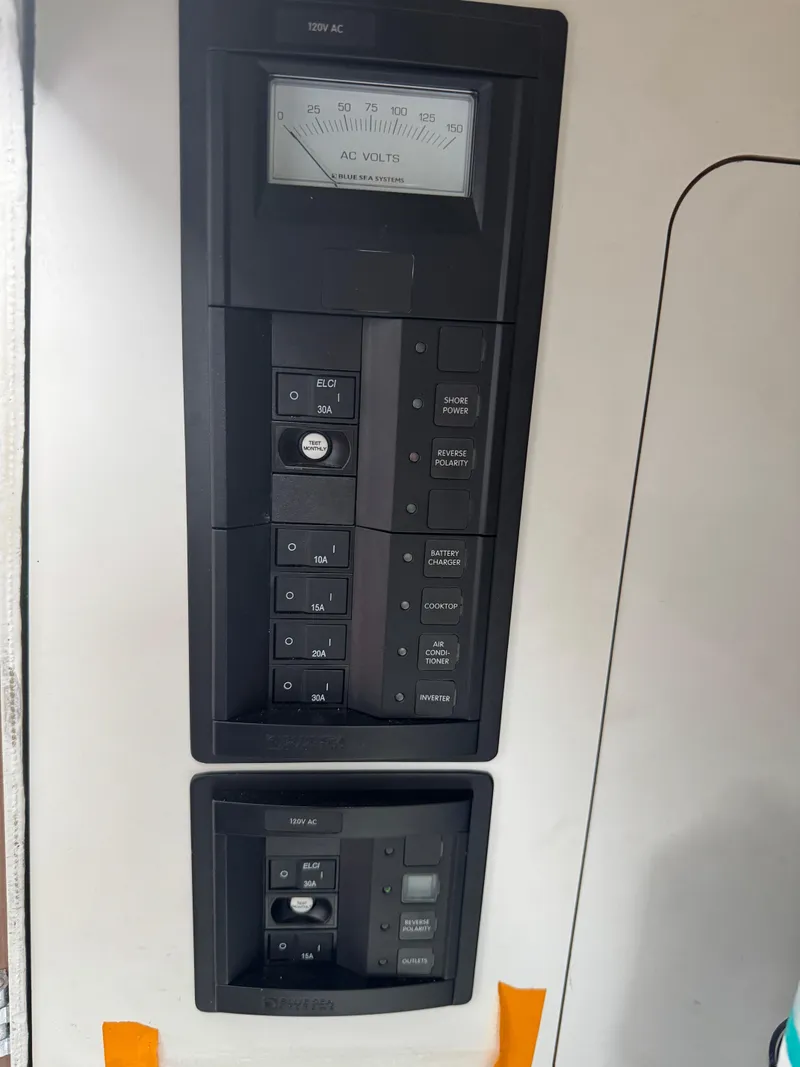 Slide: The Image of Electrical control panel on a 2020 Jeanneau NC Sport 795 boat. - 28