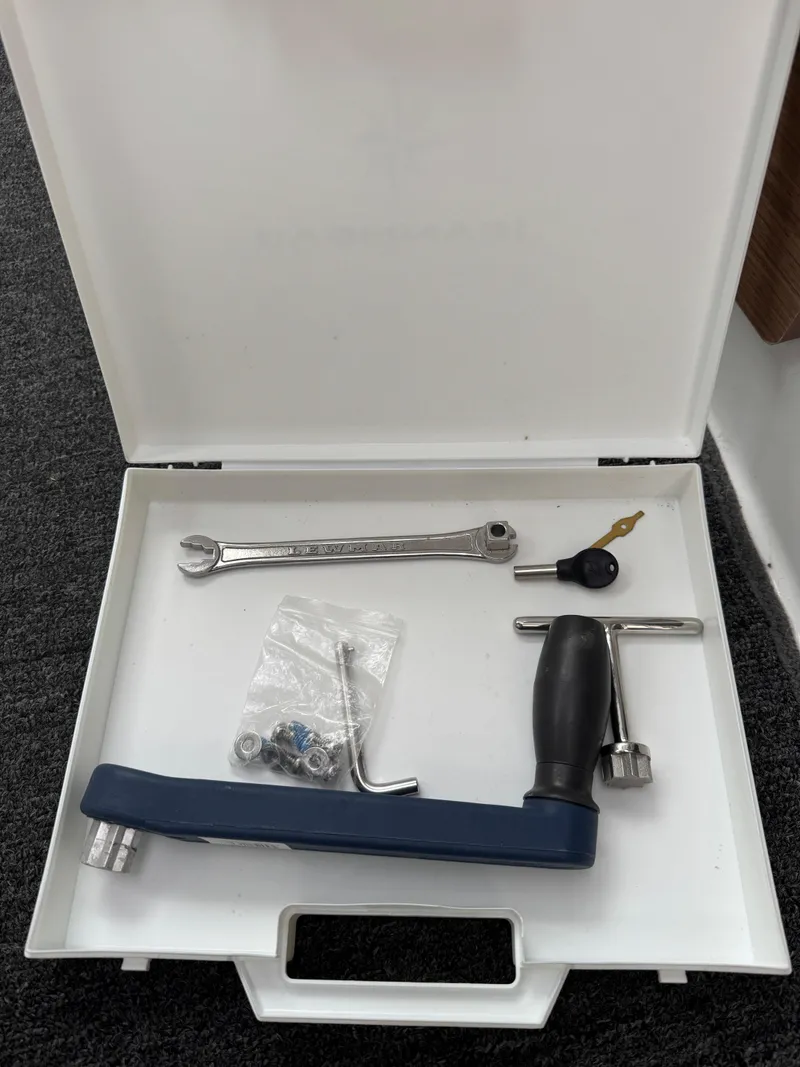 Slide: The Image of Tool kit for Jeanneau NC Sport 795, 2020 model, including wrench and key. - 29