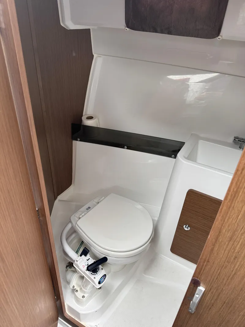Slide: The Image of 2020 Jeanneau NC Sport 795 boat bathroom with toilet and sink. - 41