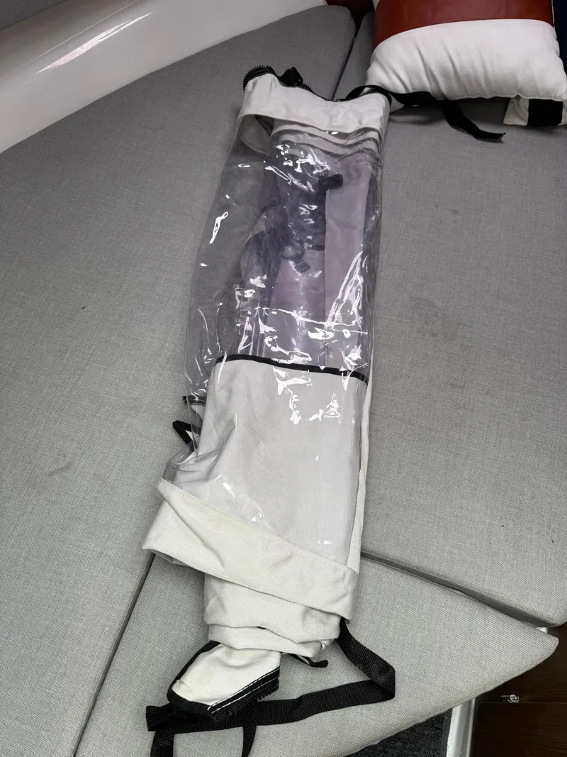 Slide: The Image of Rolled-up sail on Jeanneau NC Sport 795 boat, 2020 model, resting on a cushioned surface. - 49