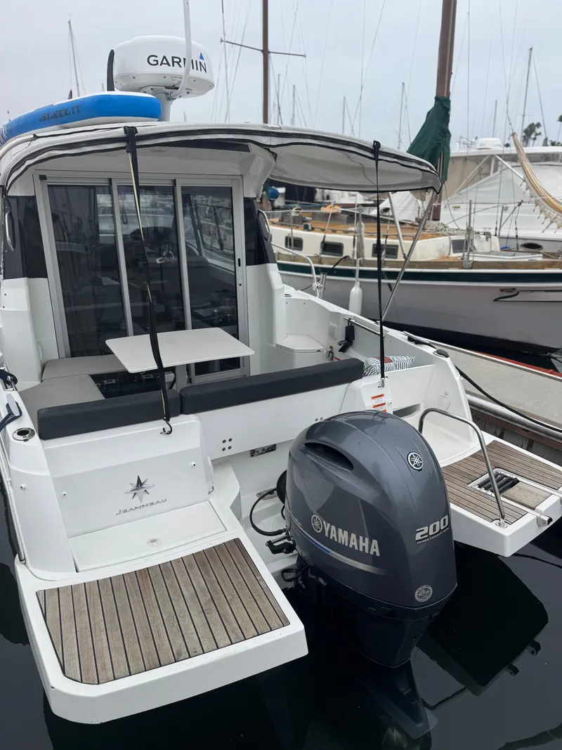 Slide: The Image of 2020 Jeanneau NC Sport 795 boat with Yamaha 200 engine, docked at marina. - 8