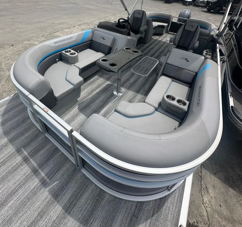 Slide: The Image of 2025 Bennington 22 SXSR pontoon boat with spacious seating and modern design. - 10