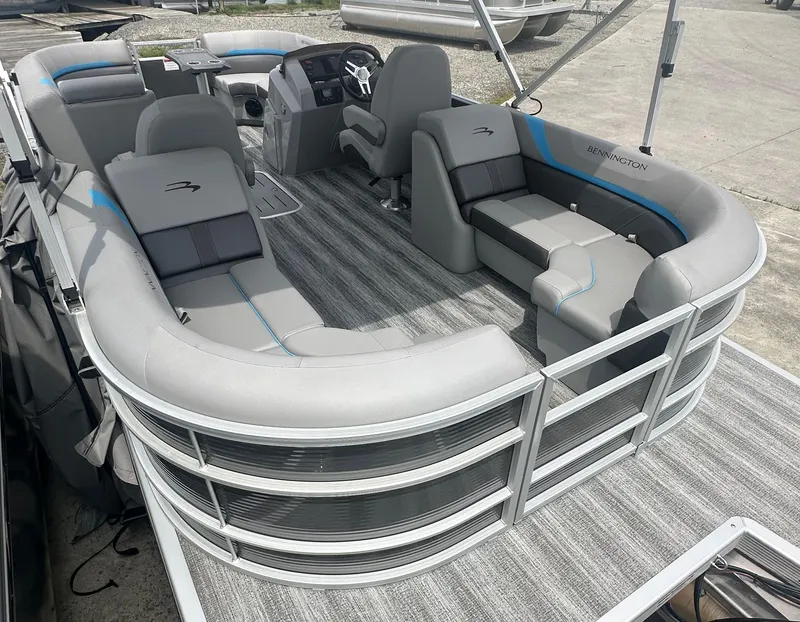 Slide: The Image of 2025 Bennington 22 SXSR pontoon boat with spacious seating and modern design. - 6