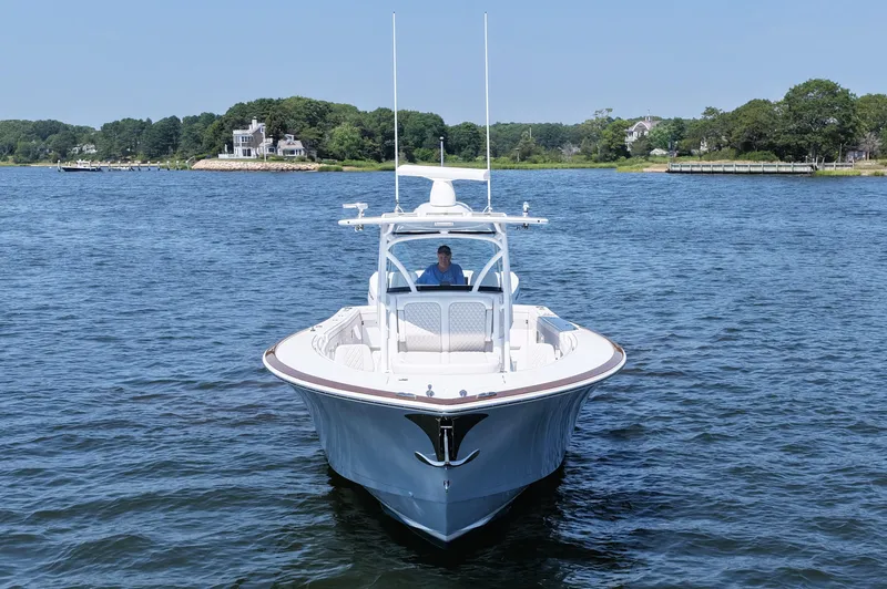 Slide: The Image of 2026 Valhalla Boatworks V-41 on calm water, scenic background. - 12