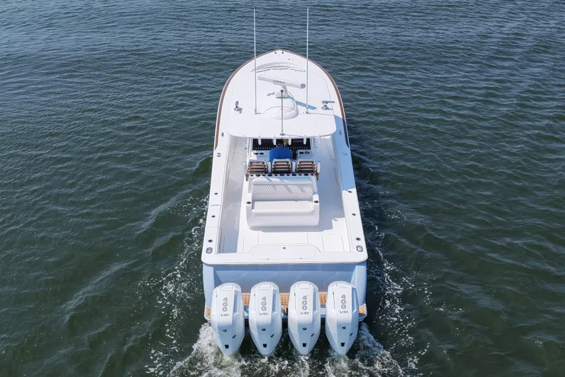 Slide: The Image of 2026 Valhalla Boatworks V-41 with four engines cruising on open water. - 17